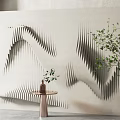 Wavy 3D Wall Sculpture Decor In Modern Interior With Small Table And Plants