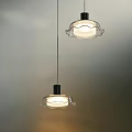 Modern Pendant Lights With Wavy Glass Shade And Metal Base Creating Warm Illumination