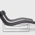 Modern Curved Lounge Chair With Metal Frame And Comfortable Dark Gray Upholstery Design