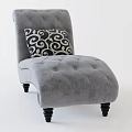 Gray Tufted Velvet Lounge Chair With Black White Swirl Pattern Pillow And Dark Legs