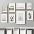 Framed Wall Art Collection With Plant Nature Prints And Various Frame Colors On Gray Wall