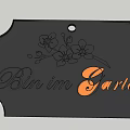 Black Garden Label With Floral Pattern And Bin im Garten Orange Text