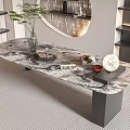 Modern Marble Coffee Table with Black Metal Legs and Decorative Items Like Vase Plant Magazine