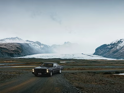 Vintage Car Driving Through Snowy Mountains And Glacier In Open Landscape 3d model