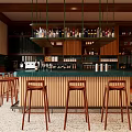 Modern Bar Interior With Wooden Tables Chairs And Lighting