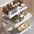 Organized Kitchen Drawer Storage With Spice Jars Bowls And Cooking Utensils