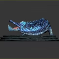 Game Movie Character Blue Icy Reptile With Open Mouth Red Interior On Stone Base