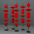 Red Lanterns Display with Various Shapes Round and Diamond Shaped on Black Stands Gray Background