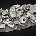 Pile Of Ancient Stone Fragments And Broken Artifacts From Archaeological Site