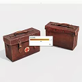 Two Vintage Brown Leather Boxes With Red Cross Emblem And Classic Storage Design