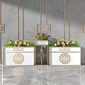 Black Garden Planters With Golden Decor Gray Wall And Colorful Flowers