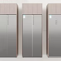 Three Modern Black And Brown Upright Refrigerators With Wooden Panel Design