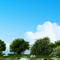 Lush Green Bushes In Garden Landscape With Blue Sky White Clouds Trees Flowers And Stones