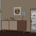 Interior Design Featuring Beige Wall Wooden Cabinet Table Lamp Framed Art Green Plant And Sunlight