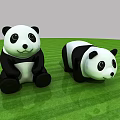 Two Adorable Panda Toys Sitting And Lying On Green Grassy Field