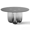 Round Black Glass Top Dining Table With Tapered Transparent Glass Legs Minimalist Design
