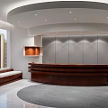 Leisure Area Interior Featuring Wooden Curved Reception Desk Circular Ceiling And Large Windows