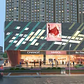Aerial Planning of Modern Urban Commercial District with High Rise Buildings Shops and Pedestrians