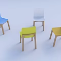 Modern Multicolored Dining Chairs Featuring Wooden Legs And Simple Plastic Seats