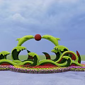 Wave Shaped Green Sculpture Flower Planter With Red Sphere And Colorful Flowers