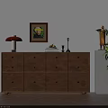 Wooden Dresser with Multiple Drawers Table Lamp Framed Artwork and Potted Plant in Sunlit Room