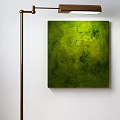 Modern Green Floor Lamp Beside Abstract Painting On White Wall Interior