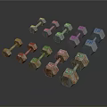 Various Sizes And Colors Fitness Dumbbells With Gray And Rusty Brown On Dark Background