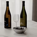 Kitchen Countertop With White Marble Wine Bottles Wine Glass Silver Bowl And Black Olives