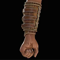 Detailed Leather Bracer With Metal Buckles On Clenched Fist Against Black Background