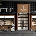 SCTC Coffee Shop Storefront with Illuminated Sign Glass Doors Outdoor Seating and People Walking By