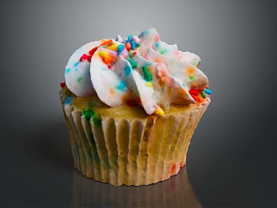 Delicious Cupcake With White Frosting And Colorful Sprinkles On Paper Liner 3d model
