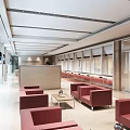 Spacious Service Hall Interior With Red Waiting Chairs Large Windows And Digital Screens