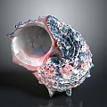 Colorful Organic Shell With Textured Surface Resembling Hair Like Fibers