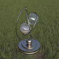 Decorative Ornament Set with Metal Stand Glass Globes and Metal Base on Green Grass