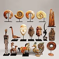 Various Carved Sculptures Display With Animal Human And Spiral Designs On Stands