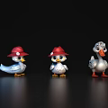 Three Duck Toys With Red Hats And Blue White Gray Colors On Black Background