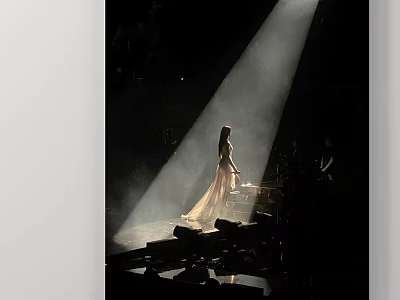 Woman In Long Dress Standing On Stage With Spotlight And Dark Background 3d model