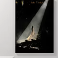 Woman In Long Dress Standing On Stage With Spotlight And Dark Background
