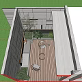 Modern Courtyard Garden With Wooden Deck Wicker Chairs Green Plants And Small Fountain