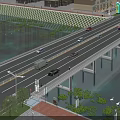 Urban Multi Lane Bridge With Vehicles Driving Over Water And Greenery