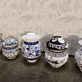 Blue And White Ceramic Vessels With Traditional Patterns Arranged In A Row 3d model