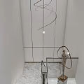 Modern Interior With Spiral Pendant Light Marble Staircase Glass Railing And Sculpture