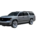 Silver Chevrolet SUV With Black Roof Rack And Multi Spoke Wheels Design
