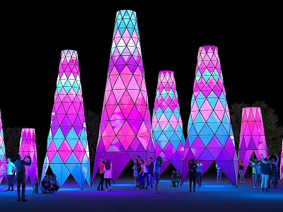 Colorful Geometric Illuminated Towers Stand At Night With People Gathering Around 3d model