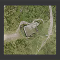 Ancient Stone Fortress Ruin With Grass Covered Top In Green Grassland Area