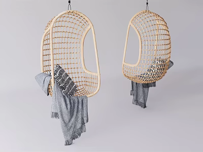 Stylish Rattan Hanging Chairs With Round Design Cushions And Gray Blankets 3d model
