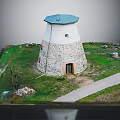 Stone Windmill Building With Dome Roof Stone Walls Grassland Pathway And Wooden Door