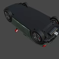 Green MINI Hatchback With Red Roof Black Accents Round Headlights And Sporty Wheels