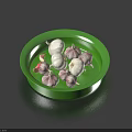 Fresh Garlic Cloves In Green Plate With White And Purple Varieties