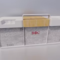 White Reception Desk With Wooden Top And BOC Logo On Glass Panels